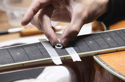 close-up view of the position mark positioning the abolone inlay